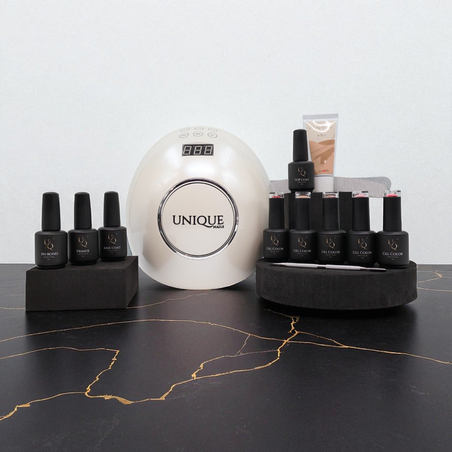 Ultimate bundel deal Unique – complete gellak set met UV/LED lamp, rubber base coat, top coat, primer, pH bond, vijlen en handcrème